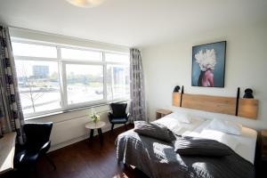 Postel nebo postele na pokoji v ubytování Hotel Medi