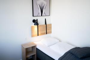 Voodi või voodid majutusasutuse Hotel Medi toas