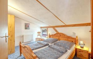 a bedroom with two beds in a room at Ferienwohnung Ribnitzdamgarten in Ribnitz-Damgarten +15 photos