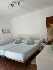 Ένα ή περισσότερα κρεβάτια σε δωμάτιο στο Apartamento La Aldaba