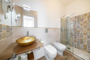 A bathroom at NG Guest House l'Acquedotto