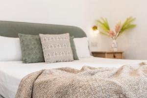 A bed or beds in a room at NG Guest House l'Acquedotto