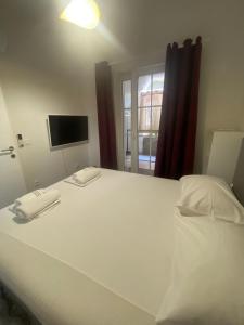 Postel nebo postele na pokoji v ubytování DUNJA apartment