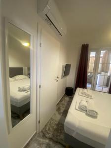 Postel nebo postele na pokoji v ubytování DUNJA apartment + 14 fotografií