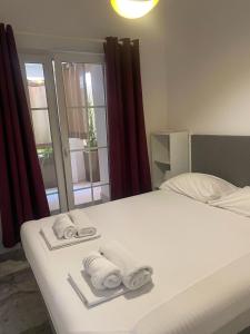 Postel nebo postele na pokoji v ubytování DUNJA apartment
