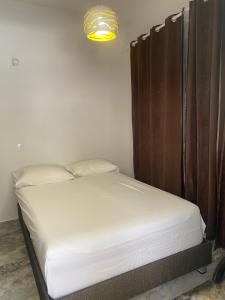 Postel nebo postele na pokoji v ubytování DUNJA apartment