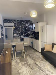 Kuchyň nebo kuchyňský kout v ubytování DUNJA apartment