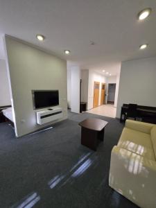 Telewizja i/lub zestaw kina domowego w obiekcie Artel Villa Tarsis