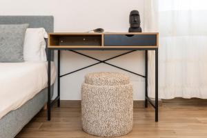 A bed or beds in a room at NG Guest House l'Acquedotto