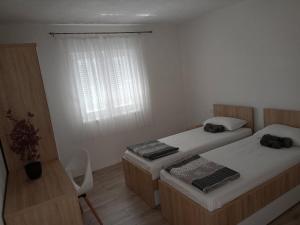 Postel nebo postele na pokoji v ubytování Villa Aldi2 + 7 fotografií
