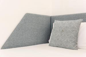 A bed or beds in a room at NG Guest House l'Acquedotto