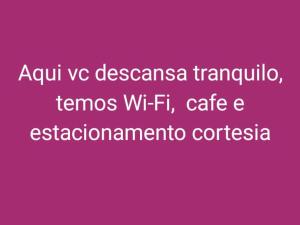 un fond rose avec les mots ayuvo desensatio transformatio tremos dans l'établissement Hotel Las Vegas Guarulhos, à Guarulhos 22 autres photos