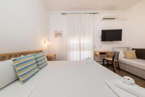 A bed or beds in a room at NG Guest House l'Acquedotto