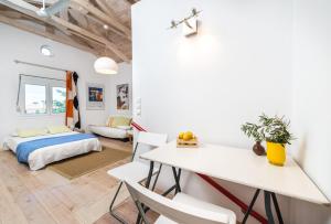 Postel nebo postele na pokoji v ubytování Gialou studio + 24 fotografií