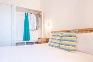 A bed or beds in a room at NG Guest House l'Acquedotto