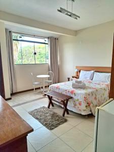 Cama ou camas em um quarto em Pousada 3 Corações Penedo