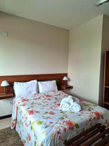 Cama ou camas em um quarto em Pousada 3 Corações Penedo