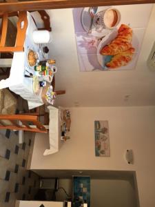 an overhead view of a kitchen with food on the ceiling at Hotel Patti in Golfo Aranci