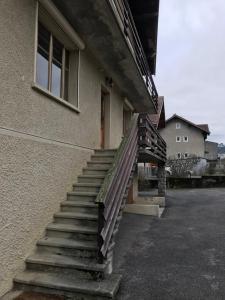 a set of stairs next to a building at Chambres à Sallanches in Sallanches