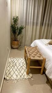 Postel nebo postele na pokoji v ubytování Tamraght cosy stay