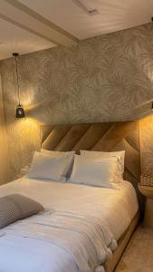 Postel nebo postele na pokoji v ubytování Tamraght cosy stay