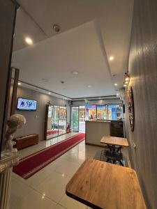 a dining room with a table and a counter at DUUM suite in Karşıyaka