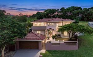 a rendering of a house with at Family Entertainer with Pool - Luxury Holiday House in Lennox Head in Lennox Head