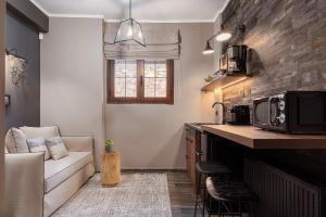 Kuchyň nebo kuchyňský kout v ubytování Miranda by GM Luxury Suites Kalavryta + 17 fotografií