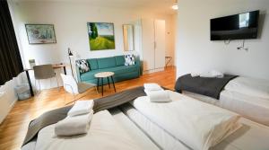 Postel nebo postele na pokoji v ubytování Hotel Nørherredhus