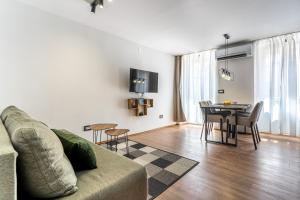 TV a/nebo společenská místnost v ubytování Ilir Apartman