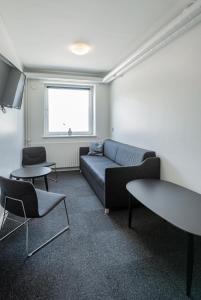 Posezení v ubytování Hotel Nørherredhus