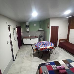 Kuchyň nebo kuchyňský kout v ubytování Complejo Corrientes Dpto 5 + 4 fotografie