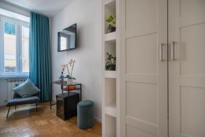 A television and/or entertainment centre at The Venue Spagna