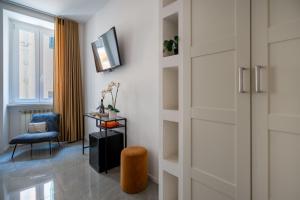 A television and/or entertainment centre at The Venue Spagna