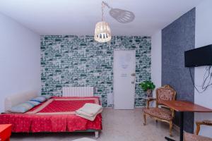 Postel nebo postele na pokoji v ubytování ksar el afia