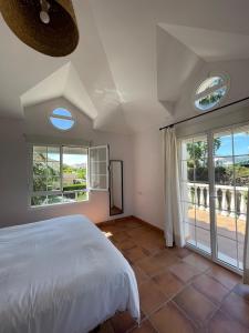 Ένα ή περισσότερα κρεβάτια σε δωμάτιο στο La casita de Monte +68 φωτογραφίες