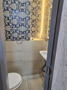 Koupelna v ubytování Pyramids Private Gate + 6 fotografií