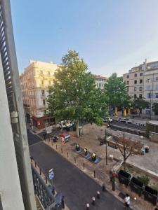 a view of a street in a city with buildings at Le Central Studio in Marseille
