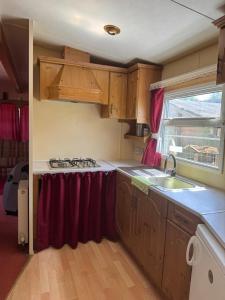 Η κουζίνα ή μικρή κουζίνα στο Chalets für Handwerker