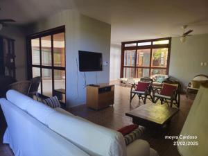 Μια τηλεόραση ή/και κέντρο ψυχαγωγίας στο Casa Centro de Ubatuba +6 φωτογραφίες