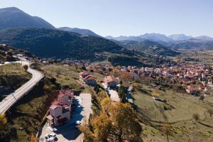 an aerial view of a village in a mountain at Leonidas by GM Luxury Suites Kalavryta in Kalavrita