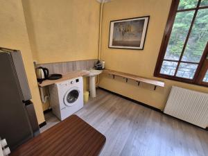 Kuchyň nebo kuchyňský kout v ubytování Hôtel Val Du Tech