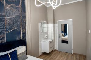 Phòng tắm tại Nestroyplatz Rooms I Self Check In +33 ảnh