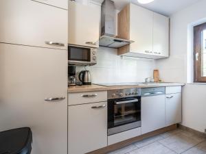 A kitchen or kitchenette at Fleckalm