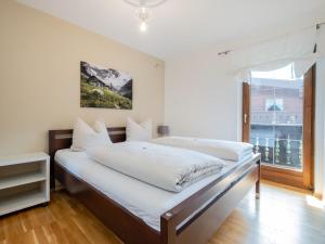 A bed or beds in a room at Fleckalm