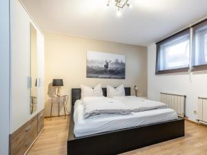 A bed or beds in a room at Fleckalm