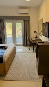 Postel nebo postele na pokoji v ubytování Hotel Midotel Seaview