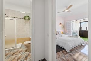 Postel nebo postele na pokoji v ubytování Habitaciones privadas cerca de la playa y aeropuerto en casa compartida con otros huéspedes