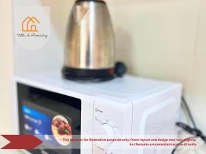 Fotografie z fotogalerie ubytování Cozy Studio unit,Cyberjaya,Wifi, Netflix,Free parking v destinaci Cyberjaya