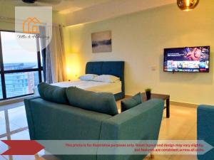 TV a/nebo společenská místnost v ubytování Cozy Studio unit,Cyberjaya,Wifi, Netflix,Free parking